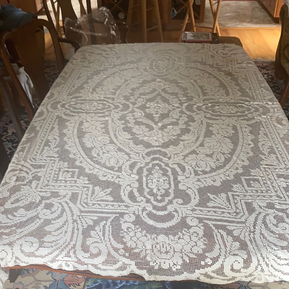 Heirloom handmade filet lace tablecloth